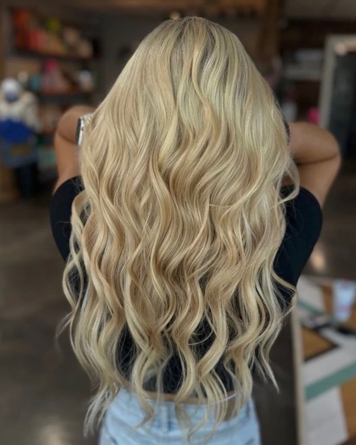 Salon NB long blonde waves styled with soft movement