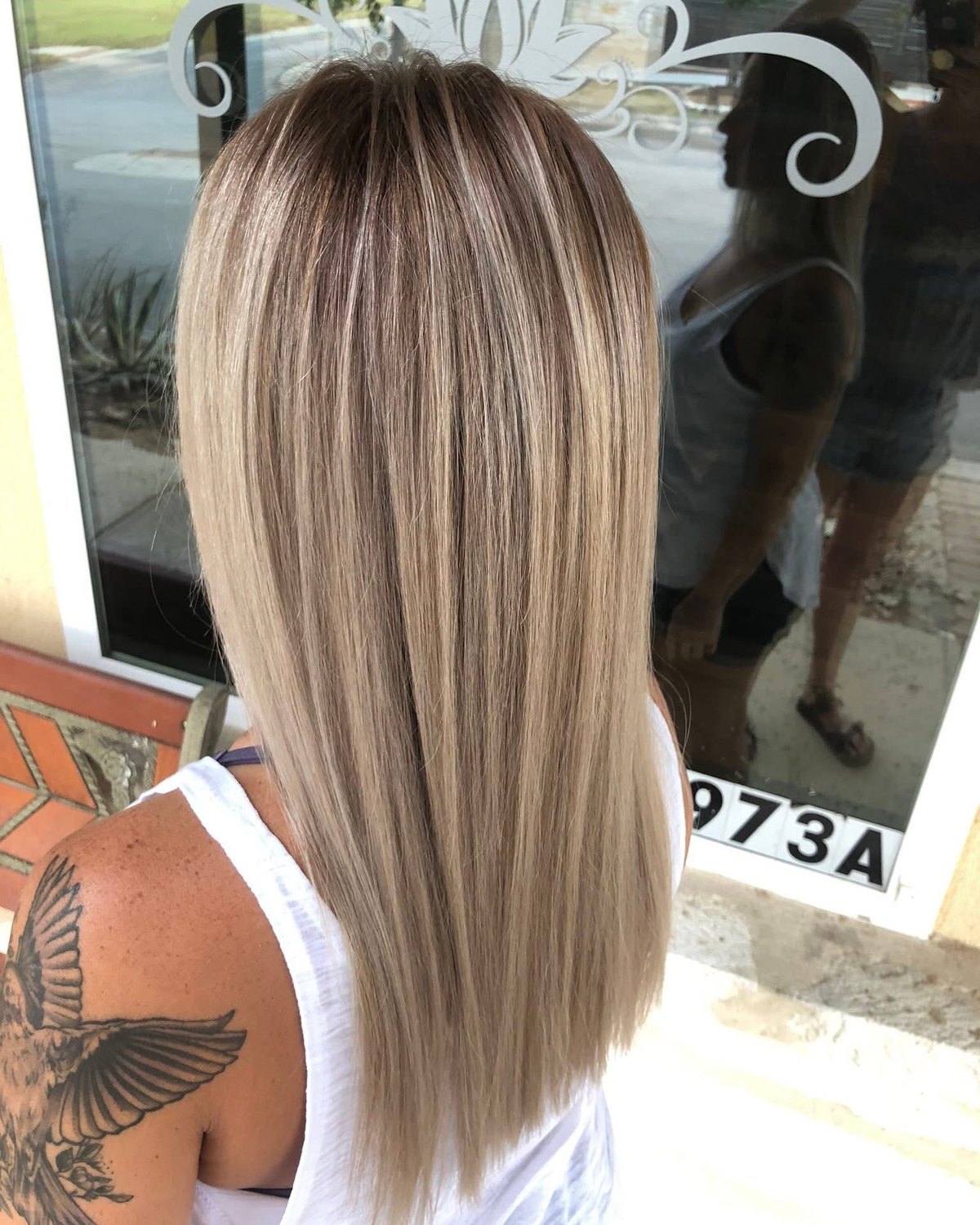 Salon NB sleek blonde highlights and blended color