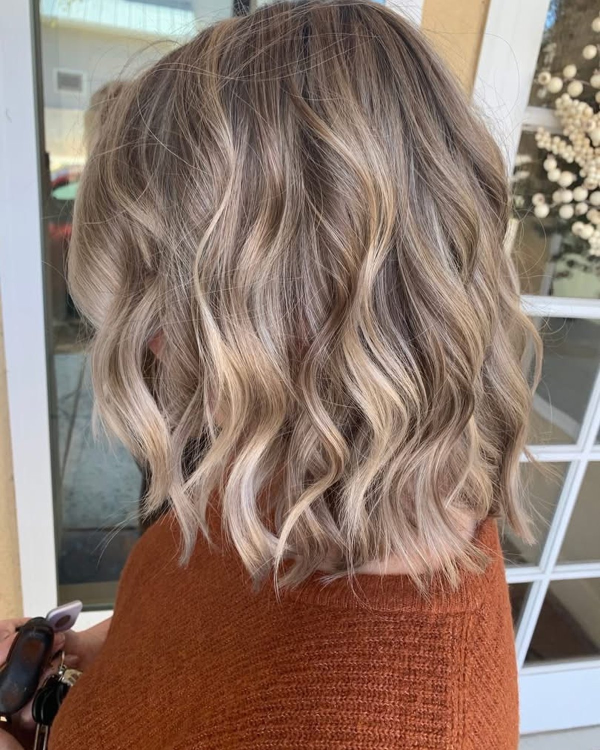 Salon NB shoulder length dimensional blonde waves